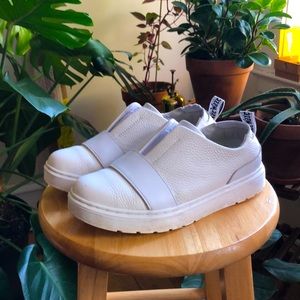 white Dr. Martens slip-on